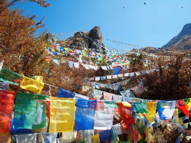 The Tiger Nest temple sitting precariously on the side of a cliff in Paro