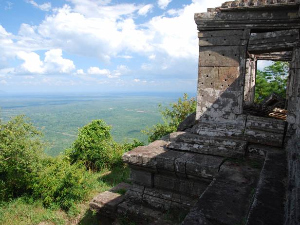 Preah Vihear Temple looking majestic against a blue sky with wispy clouds