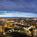 Colourful houses of Reykjavik against a backdrop of snowy mountains