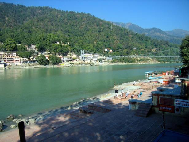 Colourful town of Rishikesh along the edge of the water
