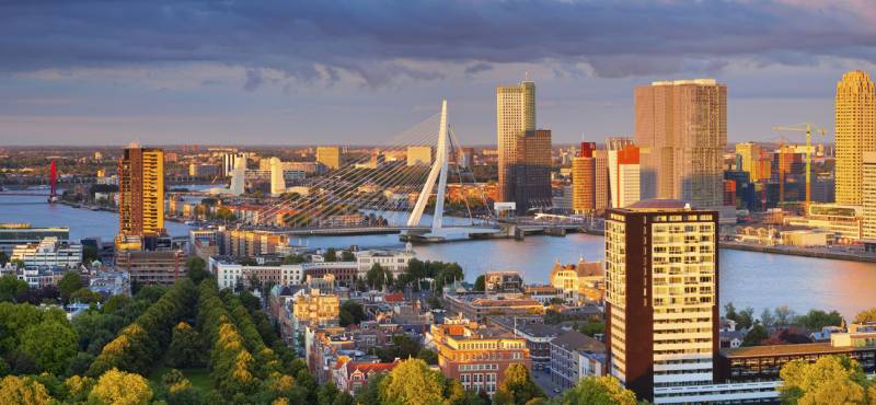 Panoramic image of Rotterdam, Netherlands during summer sunset