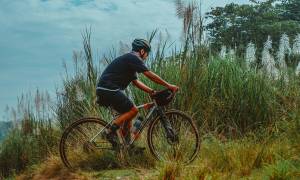 SE Asia man mountain biking