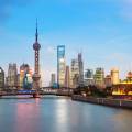 The view across the Huangpu River to the modern cityscape of Pudong in Shanghai