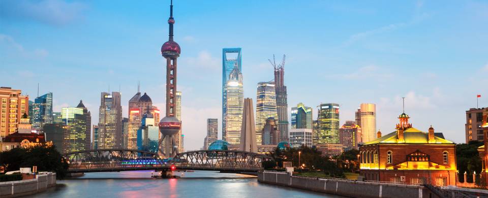 The view across the Huangpu River to the modern cityscape of Pudong in Shanghai