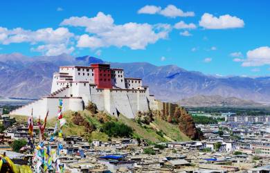 Palace sitting on top of a hill, looking over the Tibetan town of Shigatse