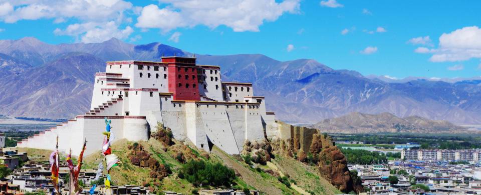 Palace sitting on top of a hill, looking over the Tibetan town of Shigatse