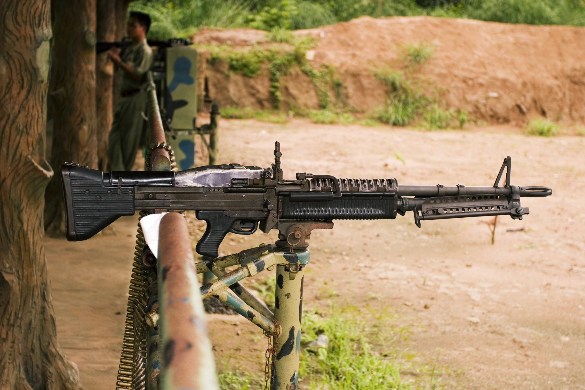 a military gun at a shooting range
