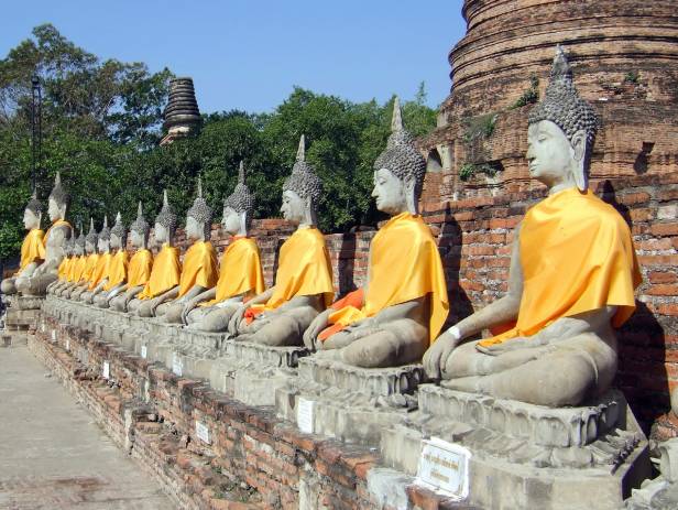 Ancient temples against a bright blue sky in Ayutthaya