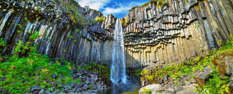 The striking Svartifoss tumbling over basalt columns in Skaftafell National Park