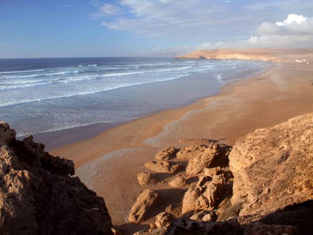 The walled city of Essaouira sitting on the edge of the water