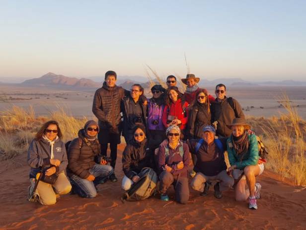 Orange sand dunes stretching into the distance at Sesriem