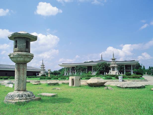 Pagodas lit up at night on the Anapji Pond in Gyeongju