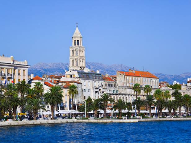 View of the main strip of Split, lined with palm trees along the waterfront