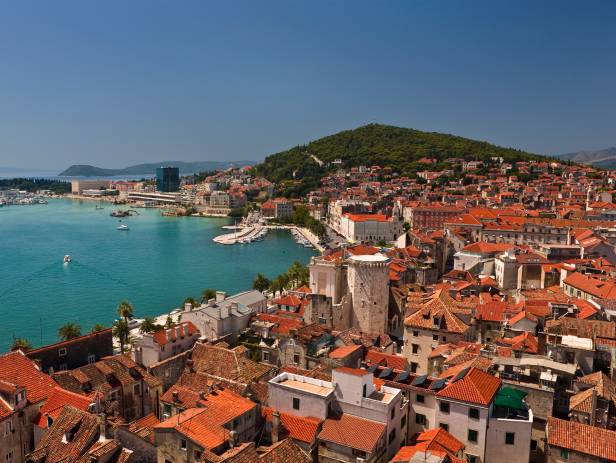 View of the main strip of Split, lined with palm trees along the waterfront