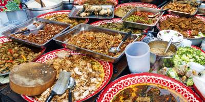 A range of tasty Thai treats at a food stall in Bangkok, Thailand