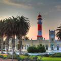 Colonial building and palm trees at dusk in Swakopmund