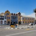 Colonial building and palm trees at dusk in Swakopmund