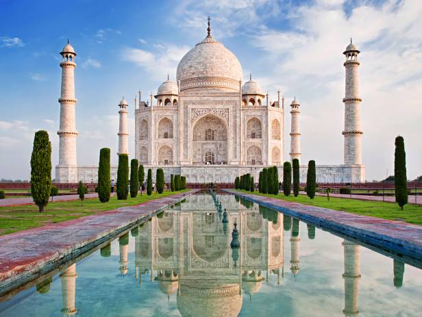 The Taj Mahal reflected in the water in Agra