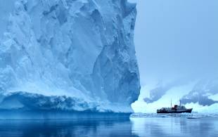 The Ushuaia with giant iceberg
