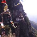 The Tiger Nest temple sitting precariously on the side of a cliff in Paro