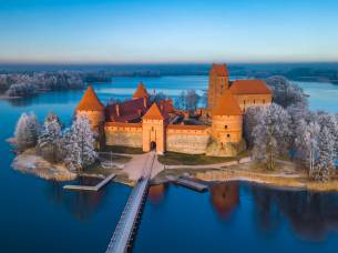 Trakai castle at winter, aerial view of the castle with frozen trees