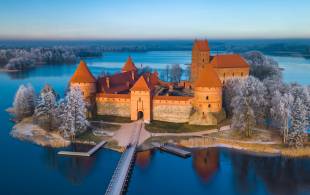 Trakai castle at winter, aerial view of the castle with frozen trees