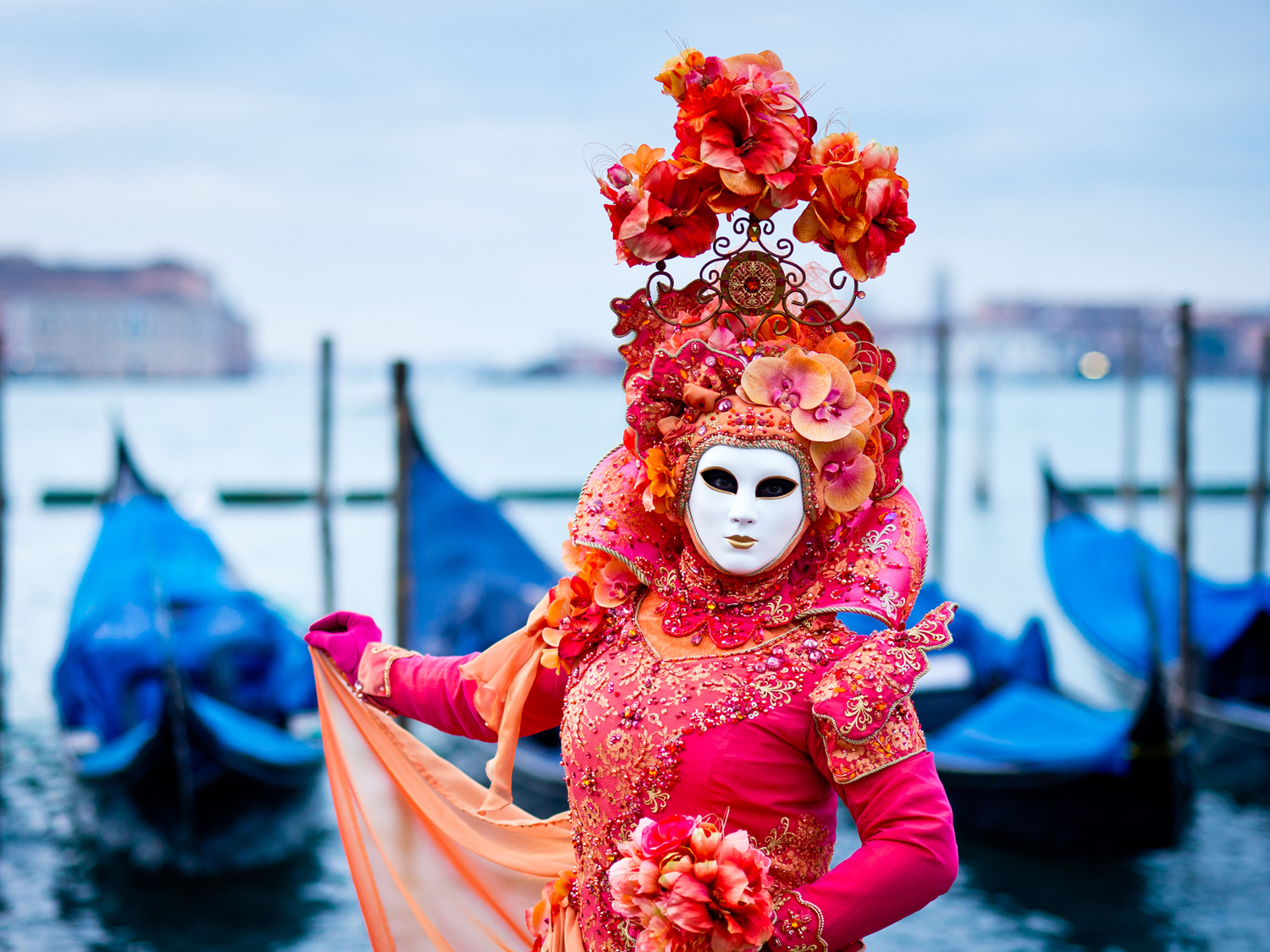 A character in elaborate costume at the Venice Carnival