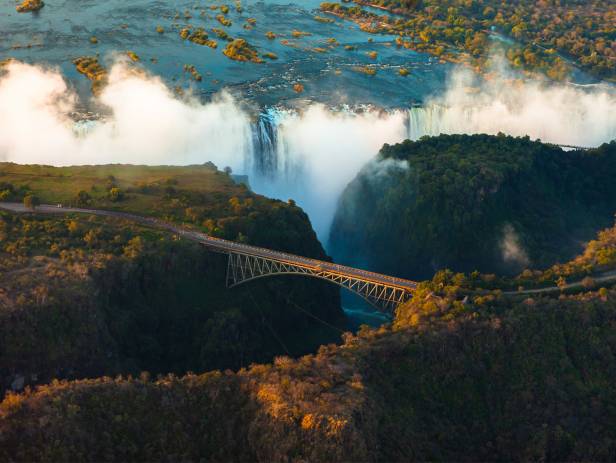 Aerial view of the dazzling blue water of Victoria Falls