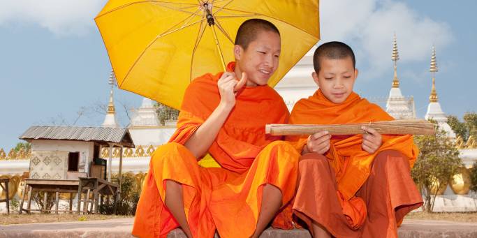 You'll see plenty of Buddhist monks on our tours to Laos