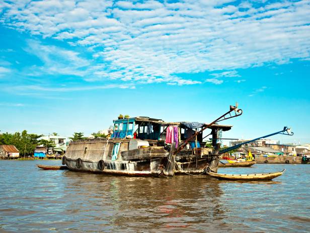 Boat making its way along the Mekong Delta near Can Tho