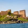 Ancient ruins standing majestically against the sky in Aswan