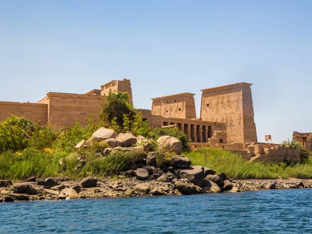 Ancient ruins standing majestically against the sky in Aswan