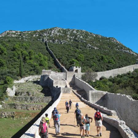 Walking along the wall of Ston - Croatia Tours - On The Go Tours