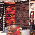 Brightly coloured textiles at a market in Otavalo