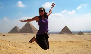 Woman jumping pyramid