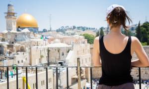 Woman looking over Jerusalem Old City - Israel Tours - On The Go Tours