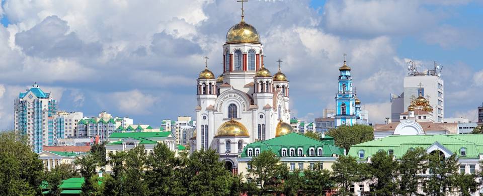 The skyline of Yekaterinburg with the golden domes of the Byzantine-style Church on the Blood