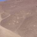 Sand dunes behind the city of Iquique and the sea in front of it