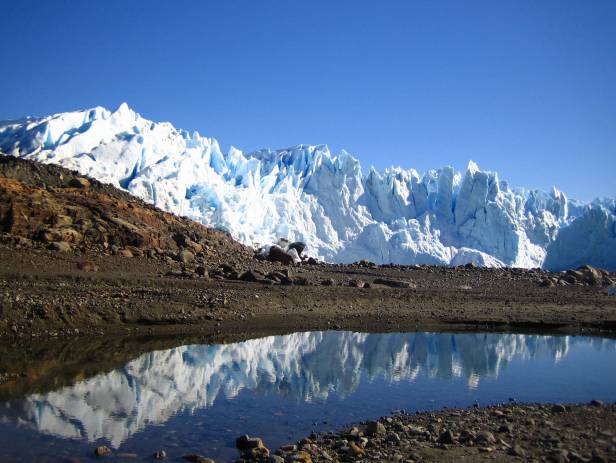 Impressive Perito Moreno glacier surrounded by snowy mountains in El Calafate