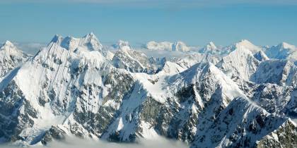 he tops of the Himalayan mountains above the clouds