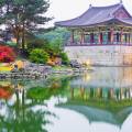 Pagodas lit up at night on the Anapji Pond in Gyeongju