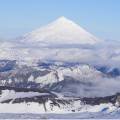 Snowy volcano behind the town of Purcon