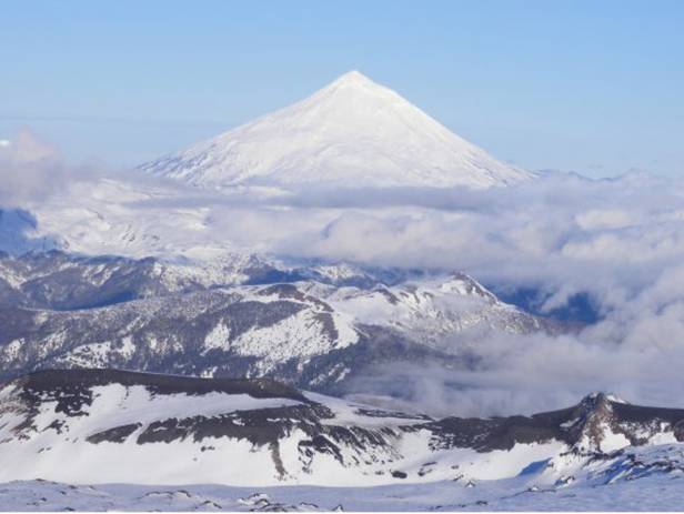 Snowy volcano behind the town of Purcon